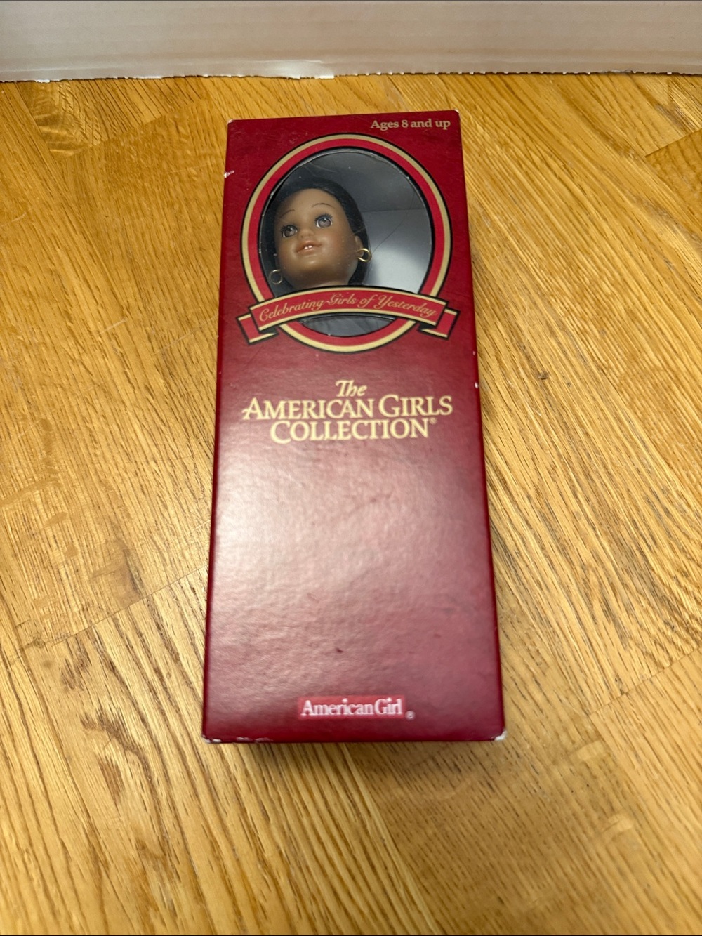 Mini collectible American girl doll with book inbox